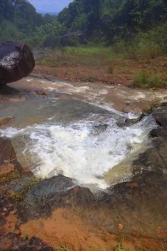 Rapid stream flowing at Chambok Waterfall in Kampong Speu Cambodia Stock Photos