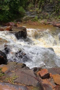 Rapid stream flowing at Chambok Waterfall in Kampong Speu Cambodia Stock Photos