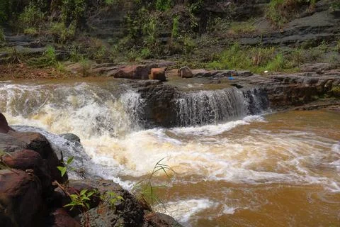Rapid stream flowing at Chambok Waterfall in Kampong Speu Cambodia Stock Photos