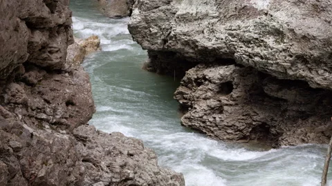 Rapid stream of a mountain river in a rocky gorge Stock Footage 168184786