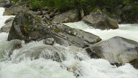 A rapid stream on a mountain river in a rocky corridor Stock Footage 342713585