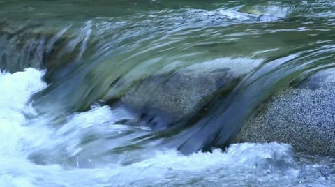 Rapid stream of a mountain river. +sound Stock Footage 16270791