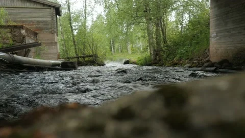 Rapid Stream Of Water Under Bridge Video stock 235169935