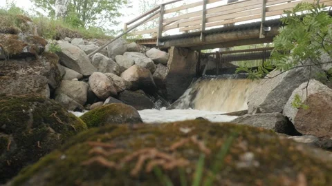 Rapid Stream Of Water Under Bridge Video stock 235169939