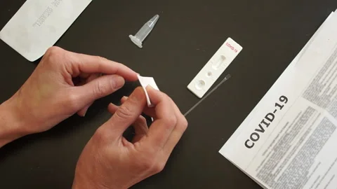 Rapid test covid 19. Test cassette and a kit of reagents for self-sampling of Stock Footage 131543387