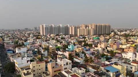 Rapid urban development seen from sky-high perspective over Chennai suburb Stock Footage 306272516
