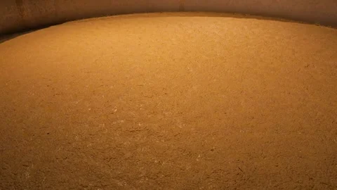 Rapidly bubbling fermentation vat for bourbon or beer production Stock Footage 323679531