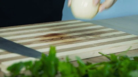 Rapidly Chopping Onion, Close-Up. White onions close up. Female hands cut oni 스톡 동영상 110704953