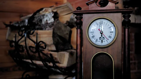 Rapidly spinning clock hand at the fireplace Stock Footage 32451853