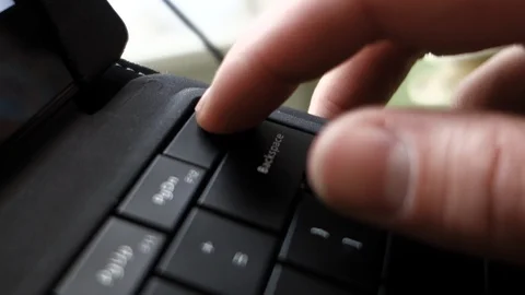 Rapidly tapping delete on a keyboard Stock Footage 113235764