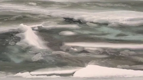 Rapids and Ice forms along the Matanuska River in Winter Stock Footage 84707500
