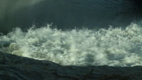 Rapids fall over the edge of a waterfall Stock Footage 93782498