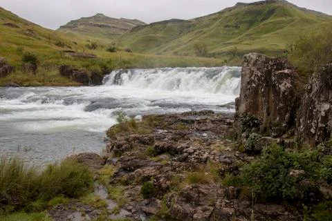 Rapids in Fast Flowing River after Heavy Rains Stock Photos