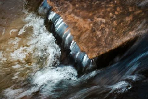 Rapids on the flat stone Stock Photos