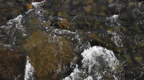 Rapids flowing over river rocks, 4K Stock Footage 56439980