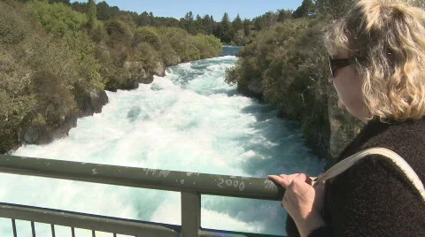 Rapids flowing under bridge Stock Footage 548850