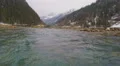 Rapids on mountain river falling in lake of cold fresh water, beautiful nature 4k or 4k+ Resolution