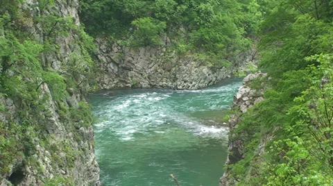 Rapids on river canyon curve Stock Footage 33635058
