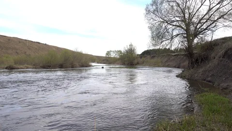 Rapids on river at spring, 4K ultra hd video footage Video stock 85991614