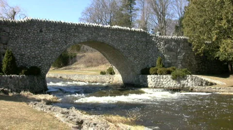 Rapids with stone bridge Stock Footage 369558