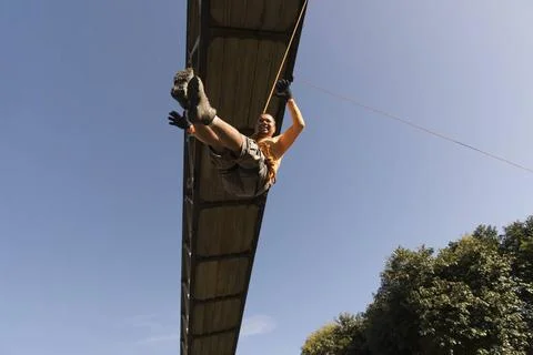  Rappel practitioner doing extreme and dangerous marbalisms. Salvador Bahi... Fotos de archivo