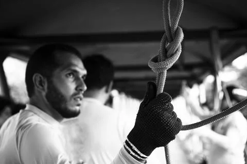 Rappel practitioners preparing the equipment to perform the activity next. Fotos de archivo