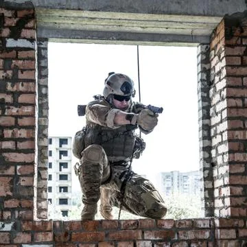 Rappeling with weapons Stock Photos