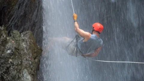 Rappelling Down Waterfall In Costa Rica Stock Footage 121389514