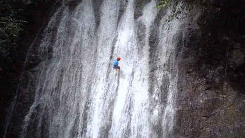 Rappelling Down Waterfall In Costa Rica Stock Footage 121389554