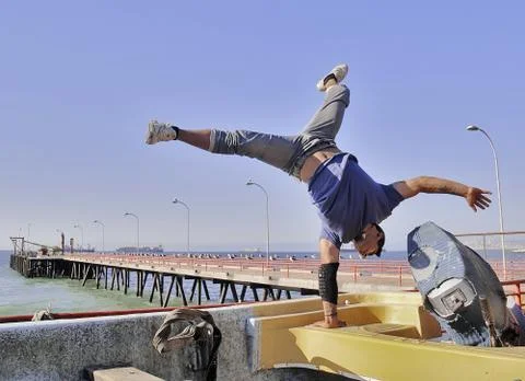 Rapper breakdancing on a boat Stock Photos