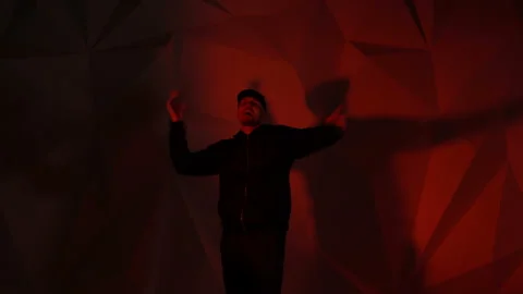 Rapper dancing to the music. Silhouette Video stock 114134626