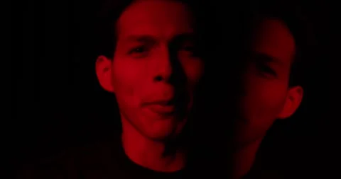 Rapper man read rap in dramatic red light. Aggressive music battle. Concert show Stock Footage 338071673