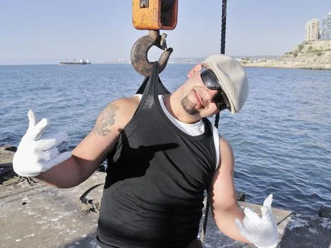 Rapper posing with a crane 3 Stock Photos
