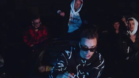 Rapper reads rap on the background of crowd people Stock Footage 229795391