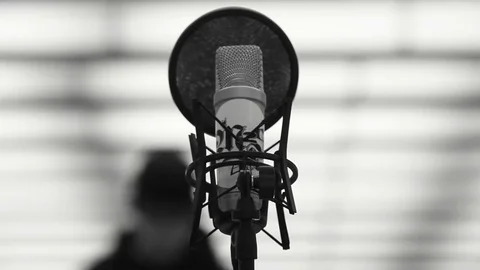 Rapper walking to reach his microphone Stock Footage 80444097