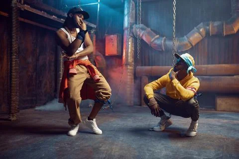 Rappers dancing, break-dance performing in studio Stock Photos
