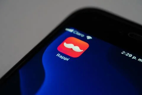 Rappi logo on the phone with the logo at the bottom, Rappi App. Stock Photos