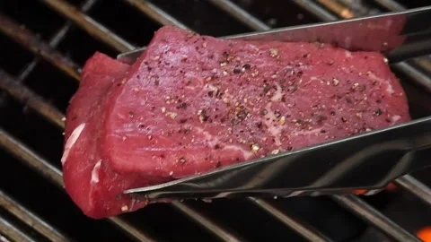 Rare beef placed on BBQ grill Video stock 114183232