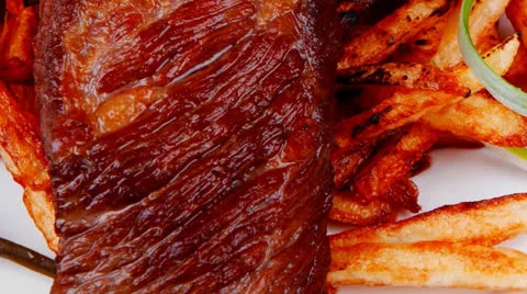 Rare beef on potato chips Vídeos de archivo 25541774