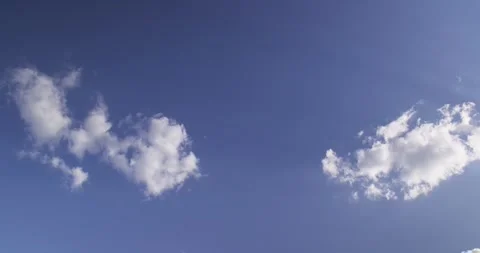Rare clouds against the blue sky on a summer day Stock Footage 256124779