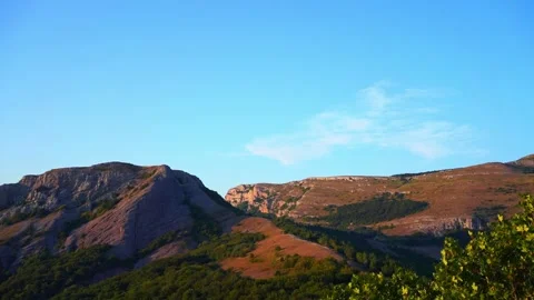 Rare clouds float over Mount Demerdzhi (Timelapse) Stock Footage 140687702