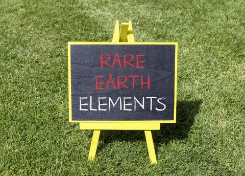 Rare earth elements symbol. Concept words Rare earth elements on beautiful ye Stock Photos