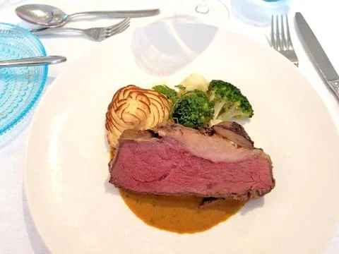 Rare filet mignon steak dinner Stock Photos