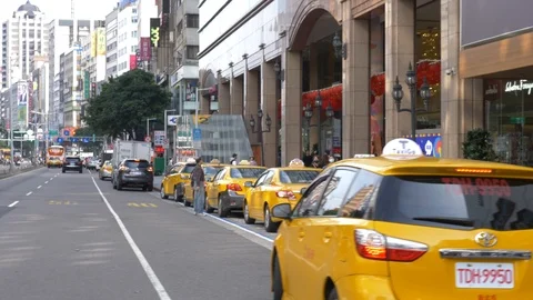 Rare gimbalized side sweep across main st zhongshan Stock Footage 122700944