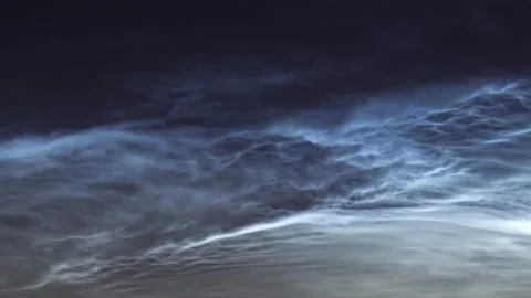 Rare noctilucent clouds illuminating the night sky Stock Footage 341428855