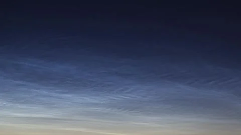 Rare noctilucent clouds illuminating the night sky Stock Footage 341700294