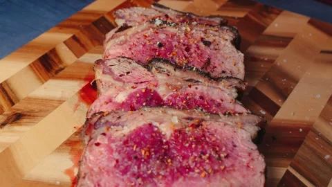 Rare Sirloin Steaks with Rub Stock Footage 325910141