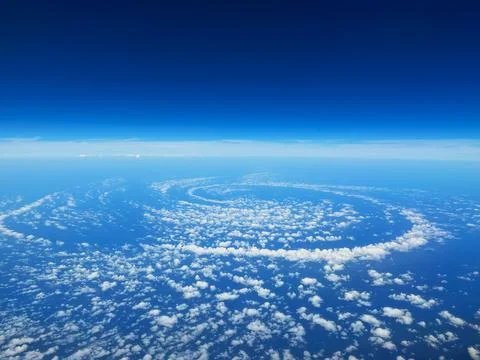 Rare Spiral Cloud Patterns Over the Ocean Seen from Above Stock Photos