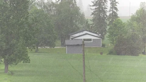 Rare spring snow storm over farm country Stock-Footage 154864095