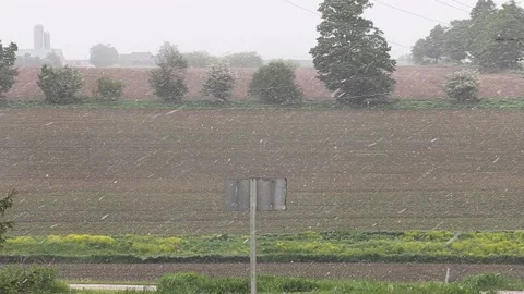 Rare spring snow storm over farm country Stockbeeldmateriaal 154865565